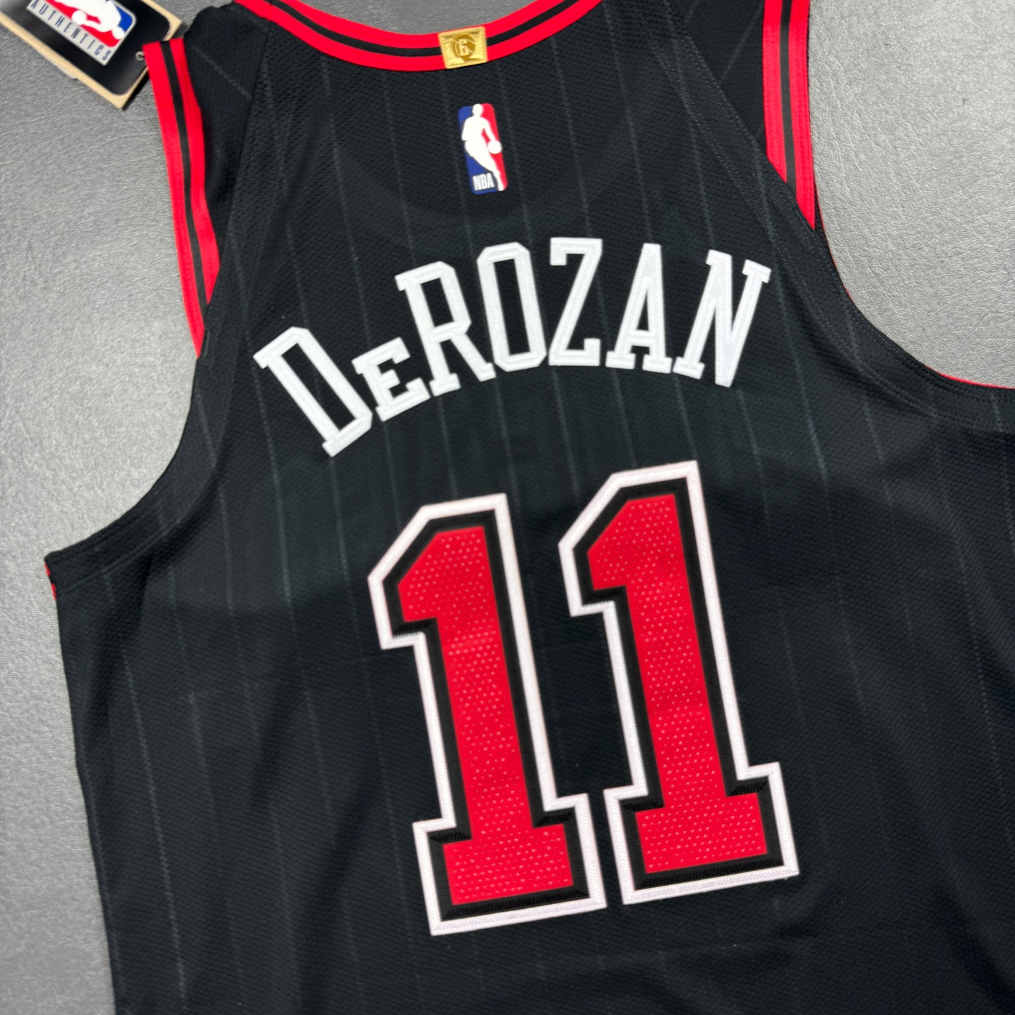 100% Authentic Demar DeRozan Nike Bulls Statement Jersey Size 44 M Motorola